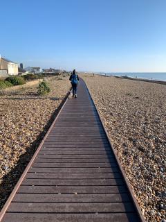 Now that's the way to walk along a shingle beach!!
